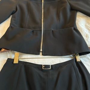 Bebe black jacket with matching skirt. Early 90’s. Short skirt